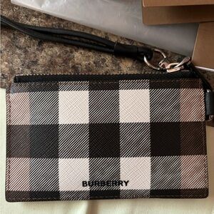 Authentic Burberry lanyard/card holder.
